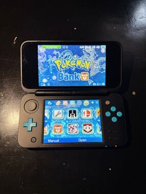 New Nintendo 2DS XL Black/Blue With Pokémon Bank, Poke transporter, & Games